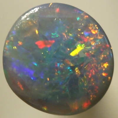 SOLID SEMI BLACK OPAL Sparkling red and orange contrasted by blue and green, all bright